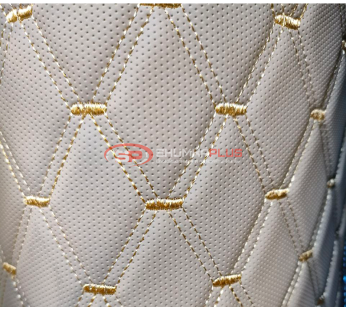 купить Перфорированная стеганая экокожа "Ромб" бежевая на поролоновой основе в Москве